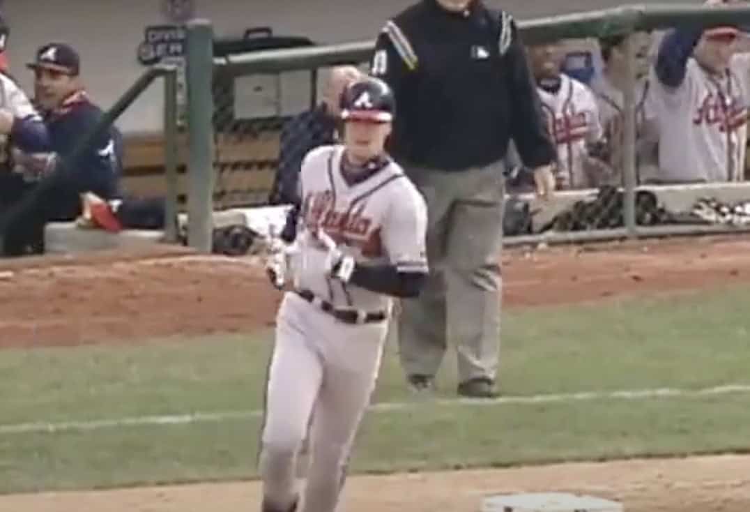 Chipper Jones batting as a legendary switch hitter, showcasing his skill from both sides.
